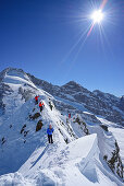 Three persons ascending on ridge towards Kleiner Kaserer, Olperer and Fussstein in background, Kleiner Kaserer, valley of Schmirn, Zillertal Alps, Tyrol, Austria