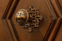 Door knob with moon face, historic city center, UNESCO world heritage site, Bamberg, Upper Franconia, Bavaria, Germany, Europe