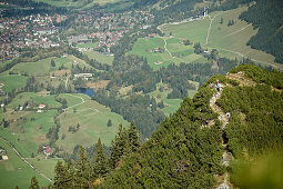 A man and a woman hiking in the mountains, Oberstdorf, Bavaria, Germany