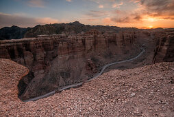 Sunset at Sharyn Canyon, dirt track through Valley of Castles, Sharyn National Park, Almaty region, Kazakhstan, Central Asia, Asia