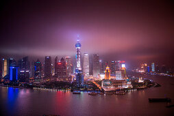 Huangpu River with Oriental Pearl Tower and Pudong skyline at night, Shanghai, Shanghai, Asia