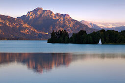 View over Forggensee to Neuschwanstein castle and Saeuling, Allgaeu, Bavaria, Germany
