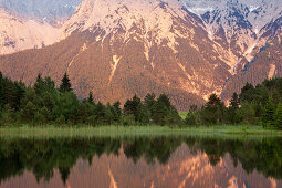 Luttensee with reflection of the mountains, view to Karwendel, near Mittenwald, Werdenfels region, Bavaria, Germany