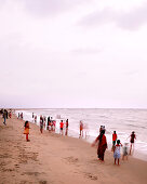 Families towards evening on the western beach of Fort Cochin, near Dutch Cemetery, Fort Kochi, Cochin, Kerala, India