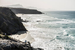surfer, Playa del Viejo Rey, La Pared, Fuerteventura, Canary Islands, Spain