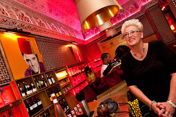 Woman at the bar in the Djellabar, Marrakech, Morocco