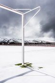 Goal post and astroturf on a football field with snow, Sierra Nevada, Granada, Andalusia, Spain