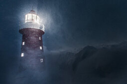 Lighthouse between deep powder snow at night, Andermatt, Uri, Switzerland