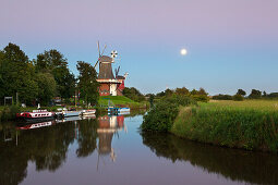 Twin windmills at full moon, Greetsiel, East Friesland, Lower Saxony, Germany