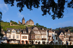 Half-timbered houses along the Banks of the Rhine river, view to Stahleck castle, Bacharach, Rhine river, Rhineland-Palatinate, Germany