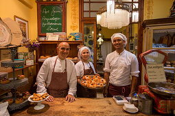 Friendly staff at Fornet de la Soca Rebosteria Artesana bakery in Old Town, Palma, Mallorca, Balearic Islands, Spain