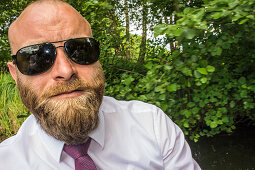 Man with beard and sunglasses in a kajak, Spreewald, Vacation, Family Tour, Family Celebration, Summer, Vacation, Oberspreewald, Brandenburg, Germany