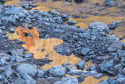 River landscape with stones in the evening, Spielmannsau, ice water, reflection, winter sun, Allgaeu, Oberallgaeu, Oberstdorf, Germany