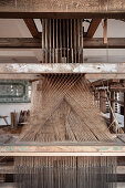 historical industrial weaving loom, textile museum at Laichingen, Swabian Alb, Baden-Wuerttemberg, Germany