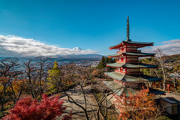 Mt. Fuji in clouds and Chureito Pagoda in autumn, Fujiyoshida, Yamanashi Prefecture, Japan