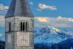 Clocktower of Reschen, Ortler in background, lake Reschensee, Vinschgau, South Tyrol, Italy