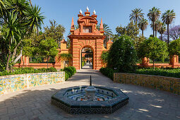 Gateway with palm trees, Jardin Marques de la Vega Inclan, Jardines del Real Alcazar, garden of the royal palace, UNESCO World Heritage, Sevilla, Andalucia, Spain, Europe