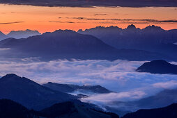 Morning mood with Kaiser range, fog in the valley, from Wildalpjoch, Sudelfeld, Mangfall Mountains, Bavarian Alps, Upper Bavaria, Bavaria, Germany