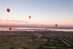 Aerial of hot air balloons above the ancient temples of Bagan, Bagan, Mandalay, Myanmar