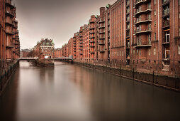 UNESCO World Heritage Speicherstadt - warehouse dock, castle during rain, Hamburg, Germany