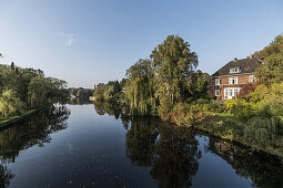 Red brick house along the Alster canal in Hamburg, Hamburg, north Germany, Germany