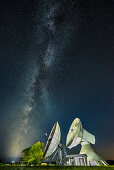 milkyway above the dish aerials of the earth station Raisting, Bavaria, Germany