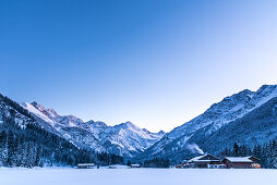 Germany, Bavaria, Alps, Oberallgaeu, Oberstdorf, Stillachtal, winter landscape in the morning, winter holidays, snow, mountains, mountain farm