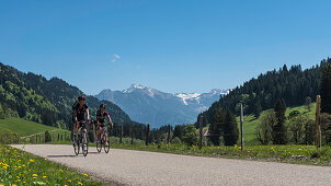 Germany, Bavaria, Alps, Oberallgaeu, Oberstdorf, Rohrmoos, Summer landscape, Summer holidays, Mountain biking in the mountains, Mountain panorama in the background
