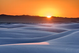 Sunrise over white sand dunes, White Sands National Monument, New Mexico, USA