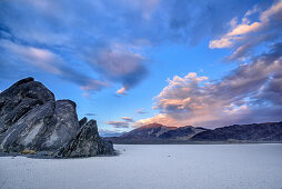 Mood of clouds above clay pan, Racetrack Playa, Death Valley National Park, California, USA