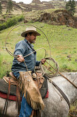 USA, Oregon, Joseph, Cowboy Todd Nash moves his cattle from the Wild Horse Creek up Big Sheep Creek to Steer Creek