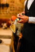 fancy way of pouring wine in the glass, Ristorante Etruria, Piazza dei Priori, Volterra, Italy Tuscany, Europe
