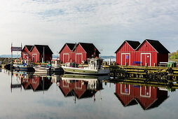Swedish boat houses in the harbor of Boltenhagen, Baltic Sea coast, Mecklenburg-Western Pomerania, Germany