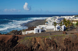 Rocky coast with the village of El Golfo, Atlantic Ocean, Lanzarote, Canary Islands, Islas Canarias, Spain, Europe