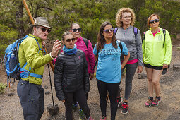 hiking guide with group of women, hiking tour along PR LP 14, hiking trail near Montana Quemada, volcanic crater,  Llano del Jable, Parque Natural de Cumbre Vieja, UNESCO Biosphere Reserve, La Palma, Canary Islands, Spain, Europe