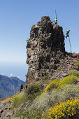 men jumping with the canarian crook, Salto del Pastor Canario, crater rim, Caldera de Taburiente, UNESCO Biosphere Reserve, La Palma, Canary Islands, Spain, Europe