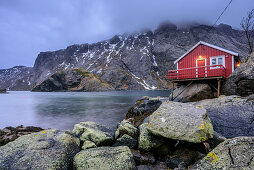 Fisherman´s cabin in Nusfjord at dusk, Nusfjord, Lofoten, Nordland, Norway