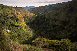 single house at mountain with view at Magdalena river gorge, archaeological excavation site La Chaquira, San Agustin, archaeological park, UNESCO Weltkulturerbe, Departmento Huila, Colombia, Southamerica