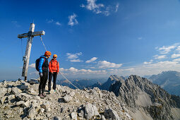 Two women standing at summit of Woerner, Woerner, Karwendel range, Upper Bavaria, Bavaria, Germany