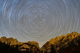 Nightsky with star tracks above Kaiser range, Wilder Kaiser, Kaiser range, Tyrol, Austria