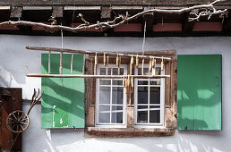 Shutters in half-timbered house in Eguisheim in Alsace, France, Europe