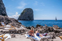 Bathhouse Fontelina with the Faraglioni rocks on Capri, Capri Island, Gulf of Naples, Italy