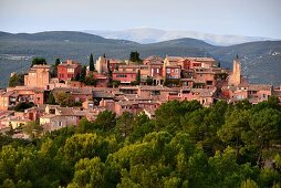 Evening view of Roussillion with Mount Ventoux in the background, Luberon, Provence, France