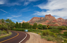 Road with van through Zion National Park, USA