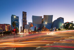 Walt Disney Concert Hall in Los Angeles at dusk with car lights