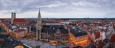Frauenkirche, town hall, Marienplatz and Kaufingerstrasse of the city of Munich from above in the evening