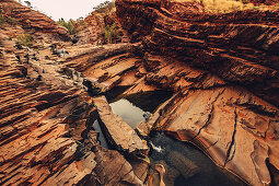 Rock formations in the Hamersley Gorge in Karijini National Park in Western Australia, Australia, Oceania;