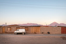 simple apartment buildings in San Pedro de Atacama, view to the Licancabur volcano in the Cordillera Occidental, Atacama Desert, Antofagasta Region, Chile, South America