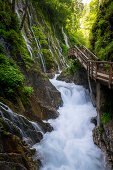 View of the steep walls and the wooden path in the Wimbachklamm, Berchtesgadener Land, Bavaria, Germany