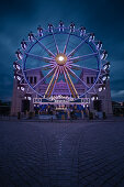 View of the ferris wheel on Koenigsplatz at sunset, Munich, Bavaria, Germany, Europe